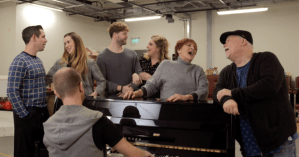 Watch a rehearsal room ”White Christmas” medley