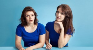 10 families performing on stage together at the Edinburgh Fringe