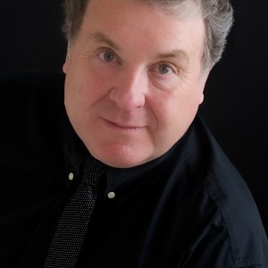 Russell Grant's <em>Thoroughly Modern Millie</em> postponed to April 2015