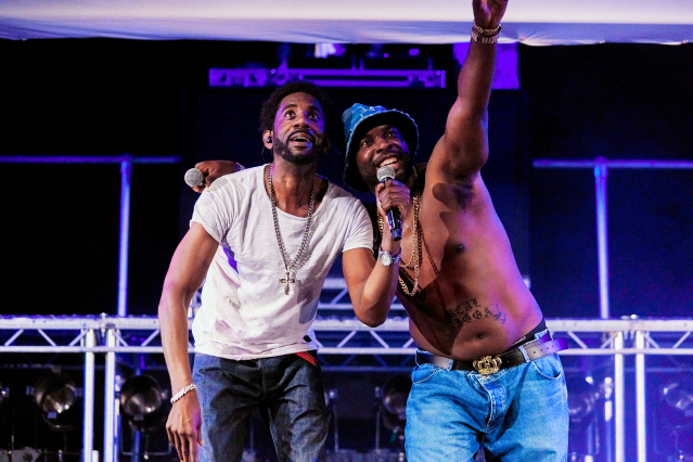 Tambo and Bones perform in a concert setting