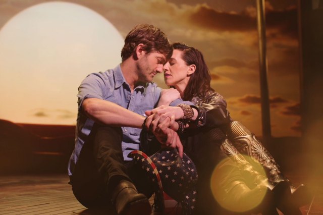 In Dreams Oliver Tompsett Lena Hall A man and woman embrace in front of a sunset in the new musical In Dreams
