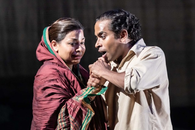 Hiran Abeysekera (Nathuram Godse) and Ayesha Dharker (Aai) in The Father and the Assassin at the National Theatre 2023. Credits Marc Brenner 3005