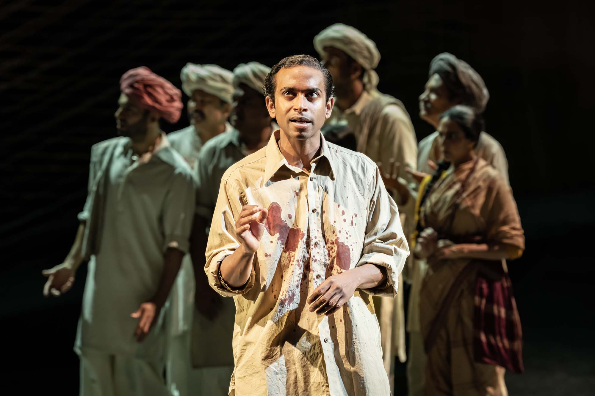 Hiran Abeysekera (Nathuram Godse) and The Father and the Assassin company at the National Theatre 2023. Credits Marc Brenner 248