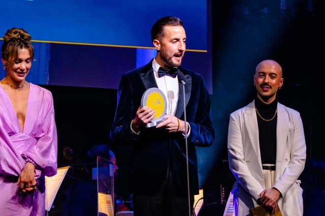 Paul Taylor-Mills accepting a WhatsOnStage Award, © Danny Kaan