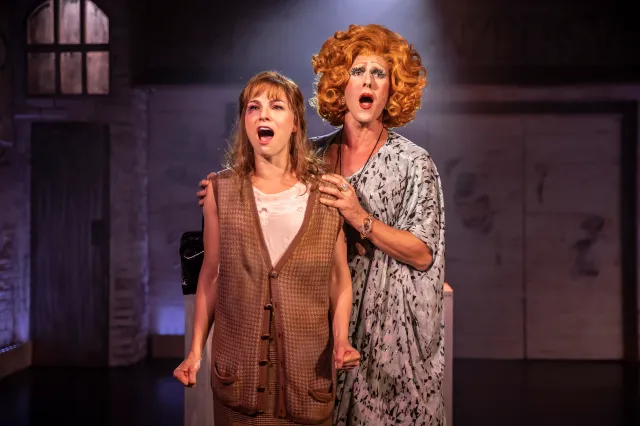 Carolyn Maitland as Carol Ann and Peter Caulfield as Vida in To Wong Foo The Musical, credit Pamela Raith Carolyn Maitland as Carol Ann and Peter Caulfield as Vida in To Wong Foo The Musical