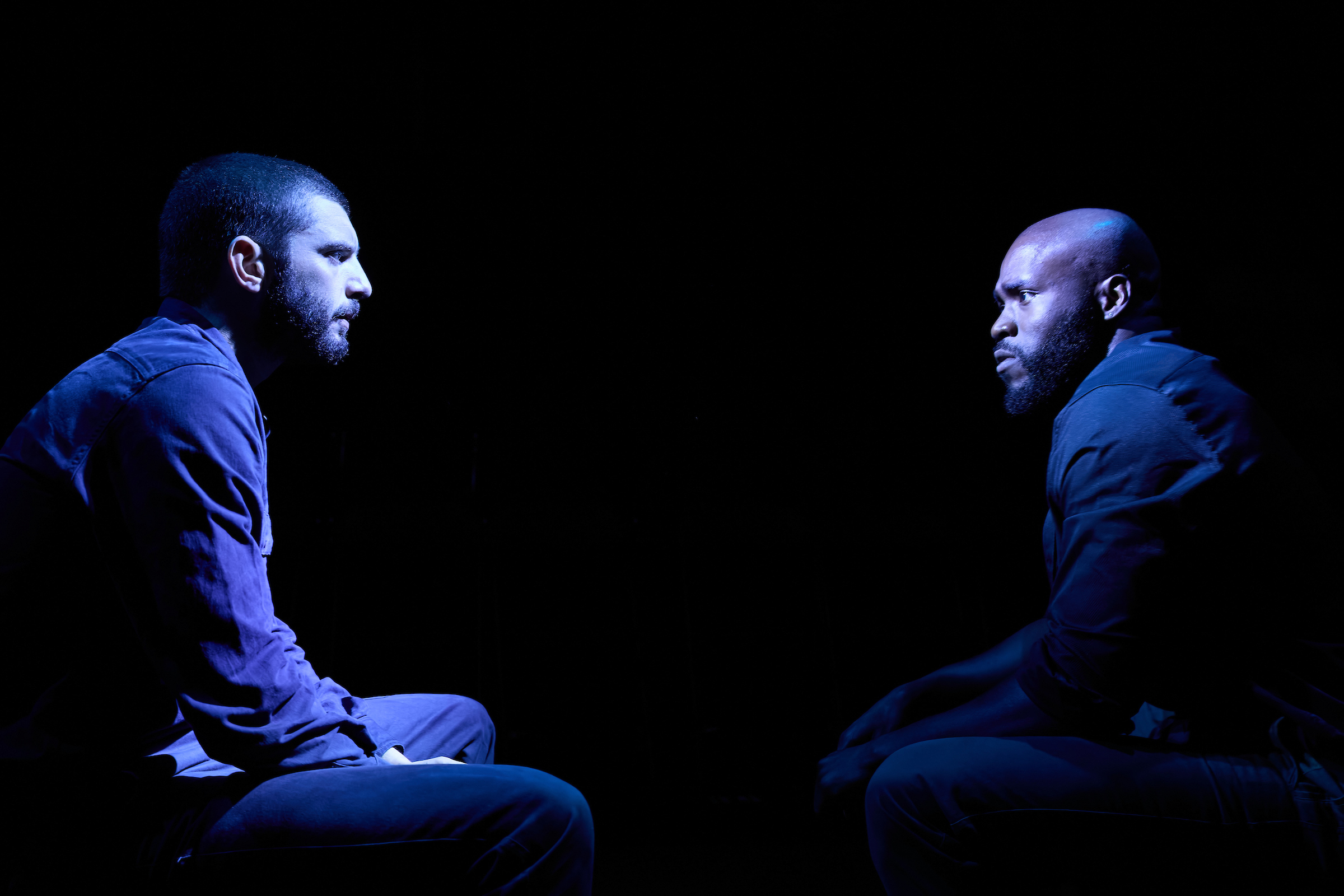 Michael C. Fox (Iago) and Martins Imhangbe (Othello) in Othello, Photo by Mark Douet
