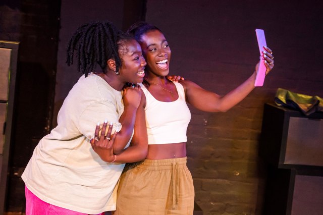 Jadesola Odunjo and Leah St Luce in a scene from FLIP! at Soho Theatre