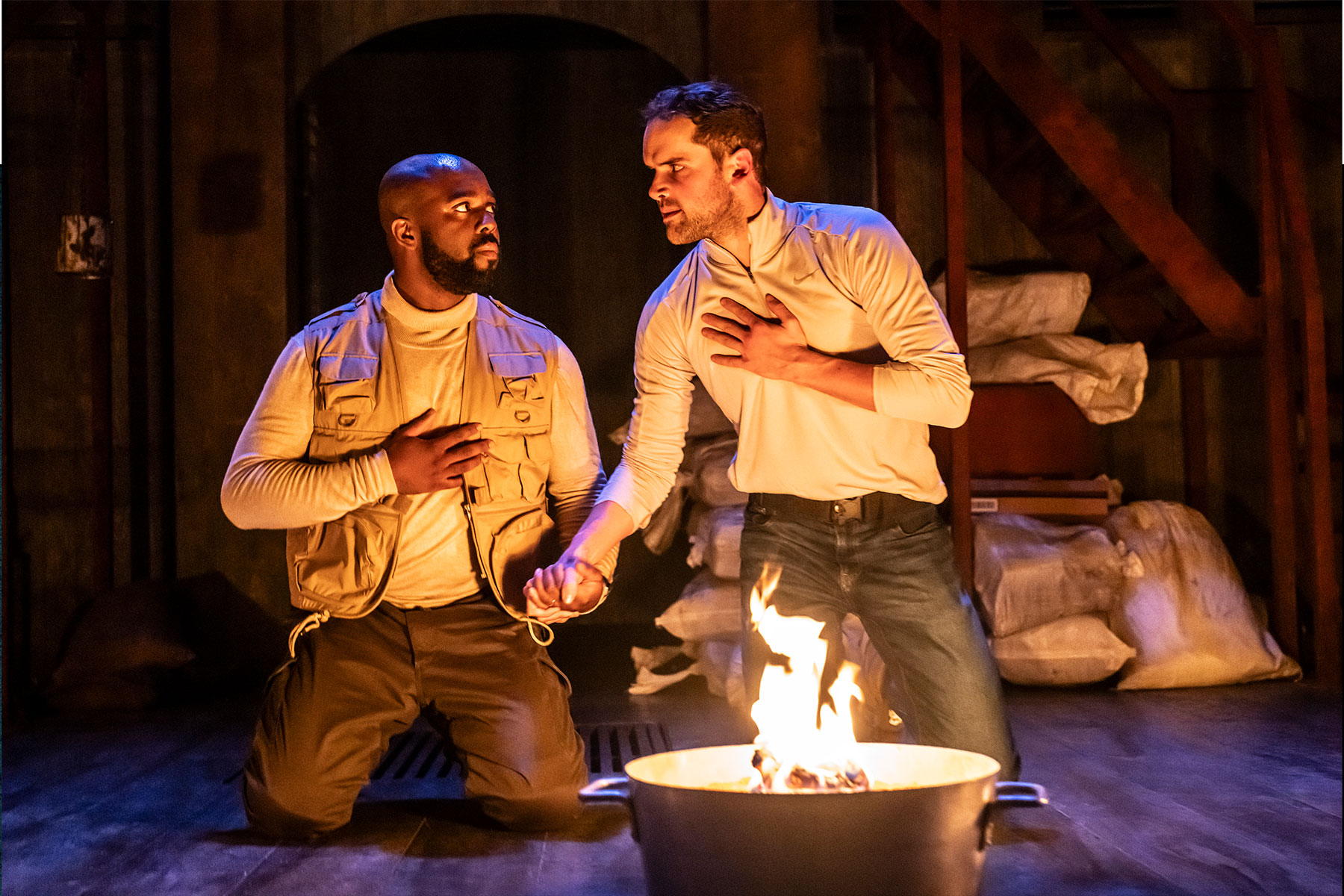 Ken Nwosu as Othello and Ralph Davis as Iago in a scene from Othello in the Sam Wanamaker Playhouse at Shakespeare's Globe
