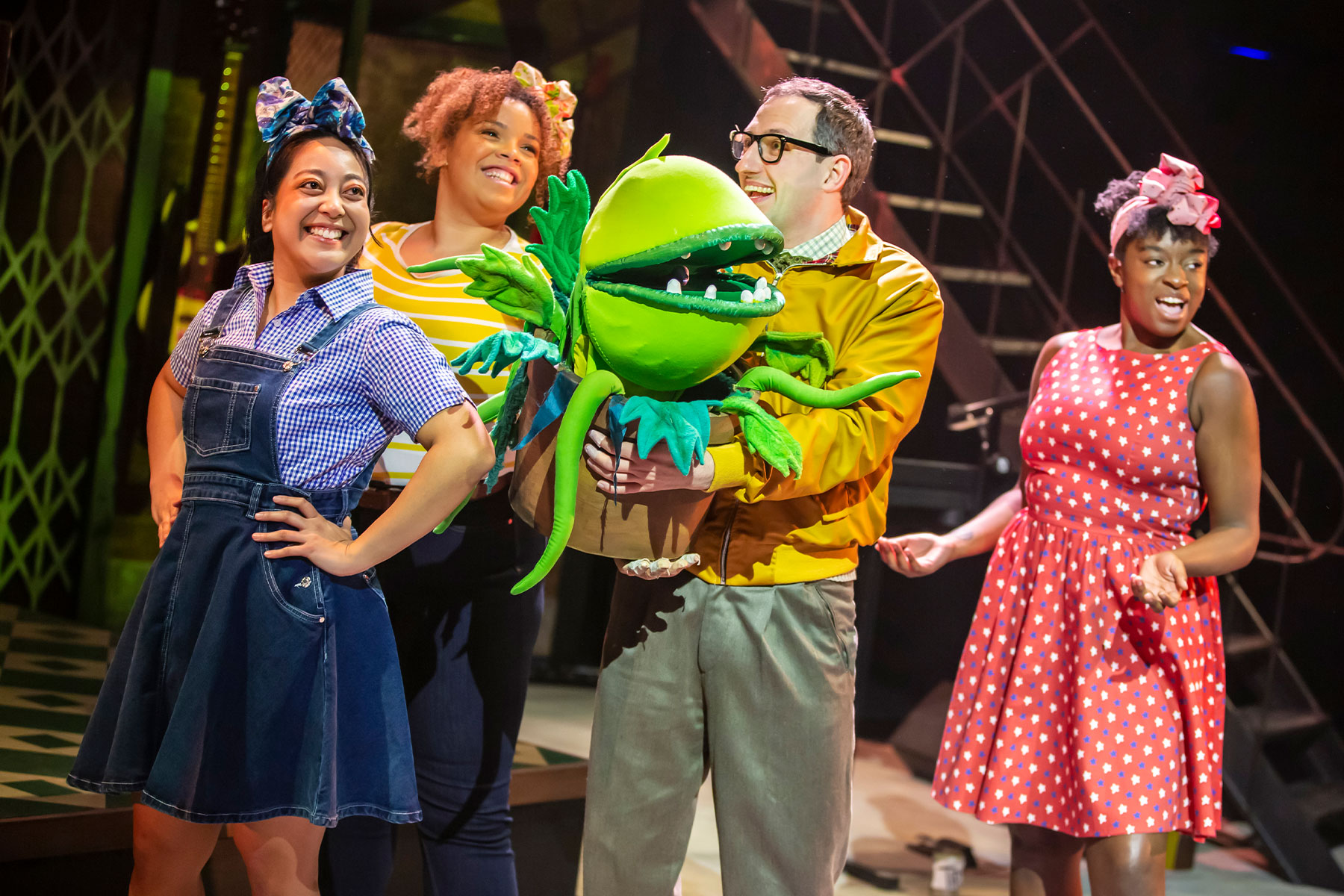 Janna May, Zweyla Mitchell Dos Santos, Oliver Mawdsley and Chardai Shaw in a scene from Little Shop of Horrors