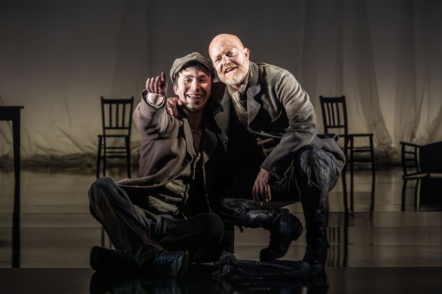 Brandon Grace (as Charley Hexam) and Jake Wood (as Gaffer Hexam) in a scene from London Tide at the National Theatre
