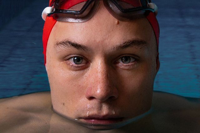 Finn Cole in a swimming pool