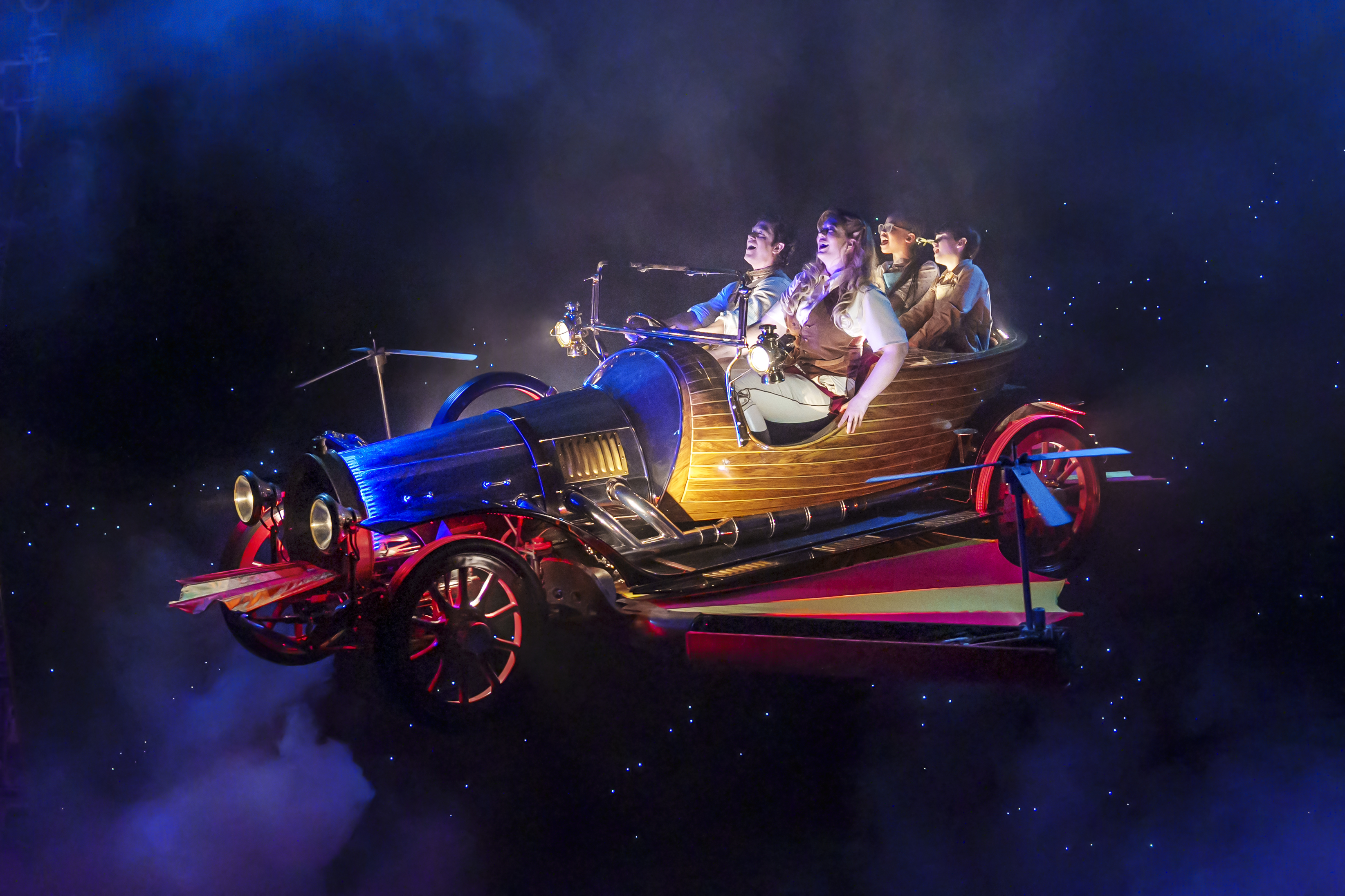 Adam Garcia (as Caractacus Potts), Ellie Nunn (as Truly Scrumptious), Ayrton English (as Jeremy) and Jasmine Nyenya (as Jemima) in a scene from Chitty Chitty Bang Bang on tour