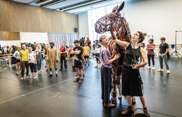 Tom Sturgess, Alexandra Donnachie and the cast of War Horse in rehearsals. Credit Pamela Raith Photography. 070