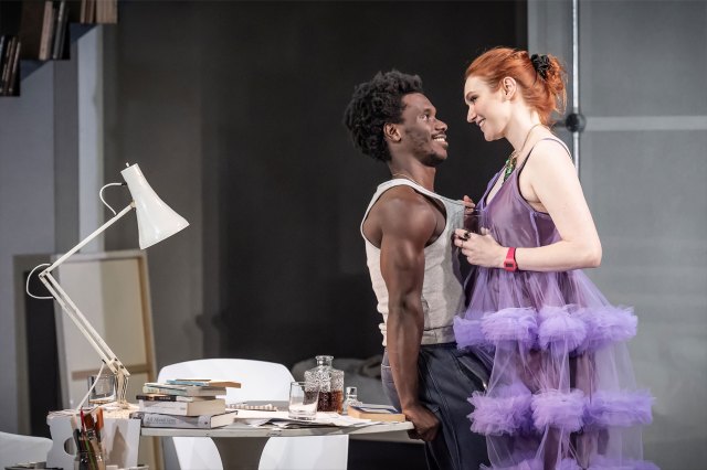 Michael Ahomka-Lindsay (as Jonathan) and Eleanor Tomlinson (as Claire) embrace in a scene from Reverberation at Bristol Old Vic