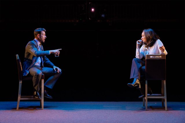  Lloyd Owen and Martina Laird sit opposite each other on stools in a scene from The New Real at the RSC's The Other Place