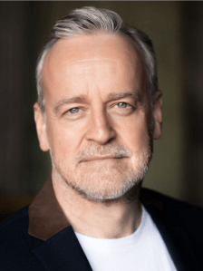 Russell Wilcox, provided uncredited