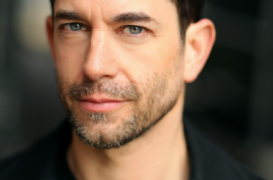 Adam Garcia, provided uncredited