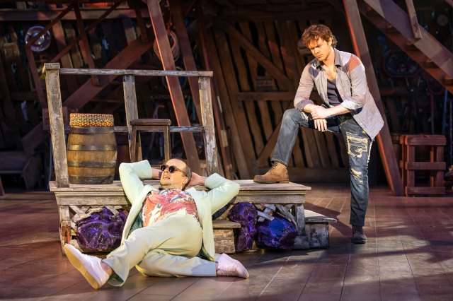 Shucked 1 Two actors on stage in a barn wearing costumes from Southern United States