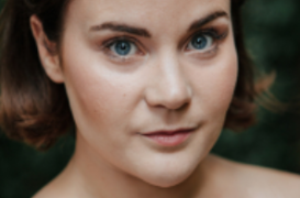 Natasha J Barnes, provided uncredited