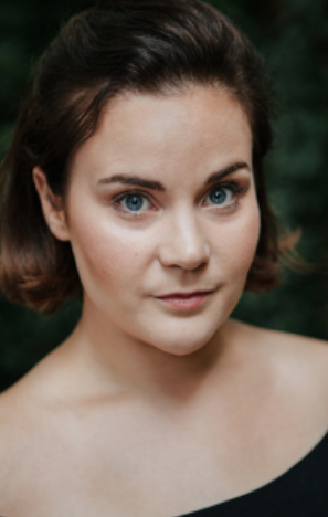 Natasha J Barnes, provided uncredited