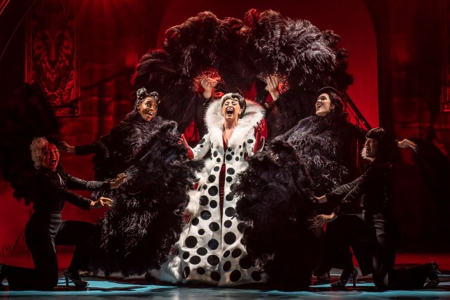 Sydnie Christmas (as Cruella De Vil) and the cast of 101 Dalmatians
