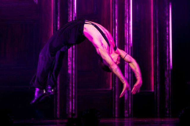 A performer does a backflip