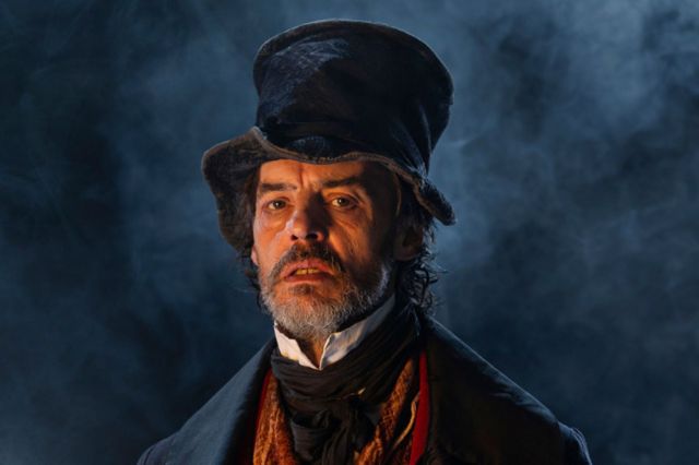 Paul Hilton as Scrooge,