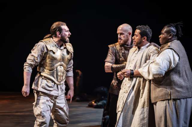 James McArdle (Pentheus), Sam Jenkins Shaw (Clitus), Ukweli Roach (Dionysos) and Tyreke Leslie (Leon) in Bacchae at the National Theatre. Photographer Marc Brenner TWO 01100