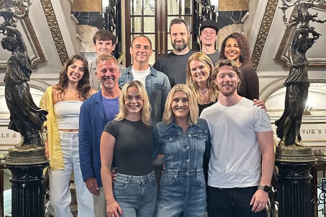 Mamma Mia cast A group photo of the new Mamma Mia cast as they stand and smile on some stairs