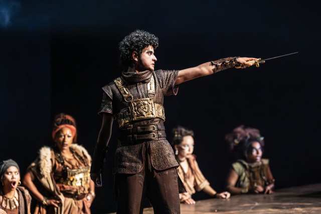Roman Asde (Alexis) and the company of Bacchae at the National Theatre. Photographer Marc Brenner ONE 00908