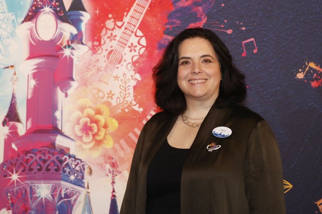 Dana Iris Harrel Dana Iris Harrel in front of a Disneyland backdrop