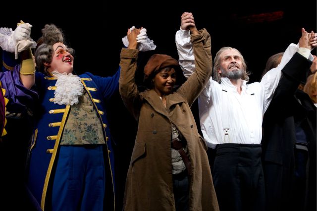 Matt Lucas (Thenardier), Alexia Khadime (Eponine) and Alfie Boe (Jean Valjean) during the curtain call for the first performance of the new cast of Les Miserables in 2011