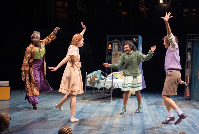 Nadine Higgin (Theo Dane), Scarlett Monahan (Posy), Nina Cassells (Pauline) and Sienna Arif Knights (Petrova) in Ballet Shoes (2025) at the National Theatre. (c) Alastair Muir BS12464