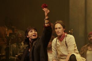 A still of Eva Noblezada and Reeve Carney in Hadestown