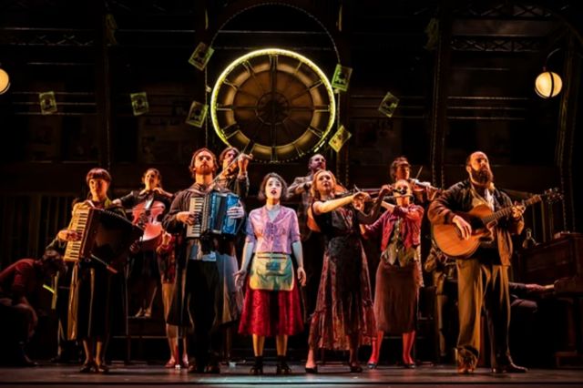Audrey Brisson and the cast in Amelie