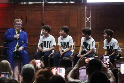 Elton John and Billy Elliot cast members