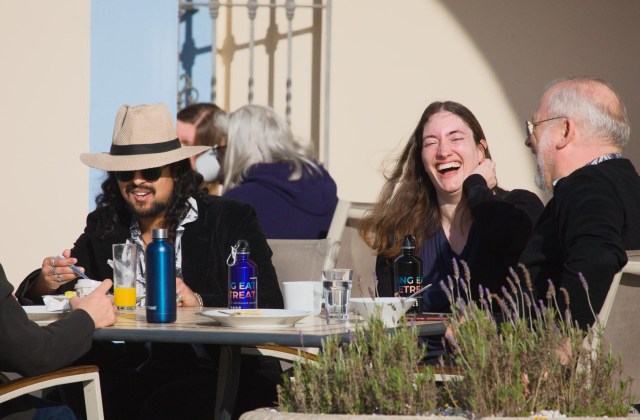 WoS George Couple on terrace laughing jpg