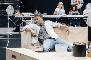 Neil McDermott in rehearsals for The Hunger Games On Stage credit Danny Kaan